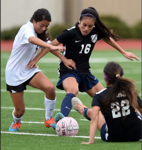 Rancho Cucamonga's Ayana Robles, left, and Chino Hills' Jessica Miclat fight for control of the ball at Los Osos High School in Rancho Cucamonga, CA, Wednesday, January 28, 2015. Chino Hills defeated Rancho Cucamonga 1-0. (Jennifer Cappuccio Maher/Inland Valley Daily Bulletin)