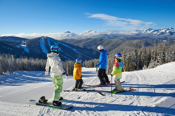 A family pauses takes in the view of North Peak on a run in Keystone. (Vail Resorts photo)