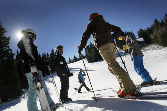 Skiers talk at the base of Solitude's Little Dollie run. (Photo by Scott Sommerdorf/The Salt Lake Tribune)