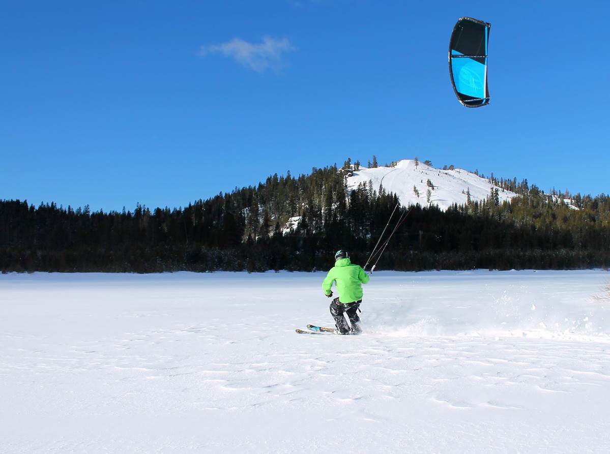 Winter skiing and spring kite flying combine for a day of fun on the snow at Sugar Bowl Resort and Royal Gorge.