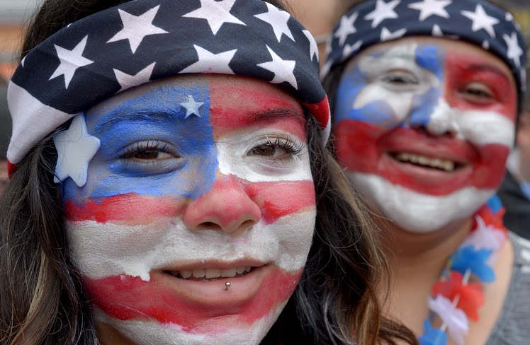 Rachel Marquez and Marissa Martin, both of Carson, with painted faces come to support the 2015 Women’s World Cup Champion United States Women’s National Team as they make their first public championship celebration at L.A. LIVE in Los Angeles, CA. Tuesday July 7, 2015. (Thomas R. Cordova-Daily Breeze/Press-Telegram)