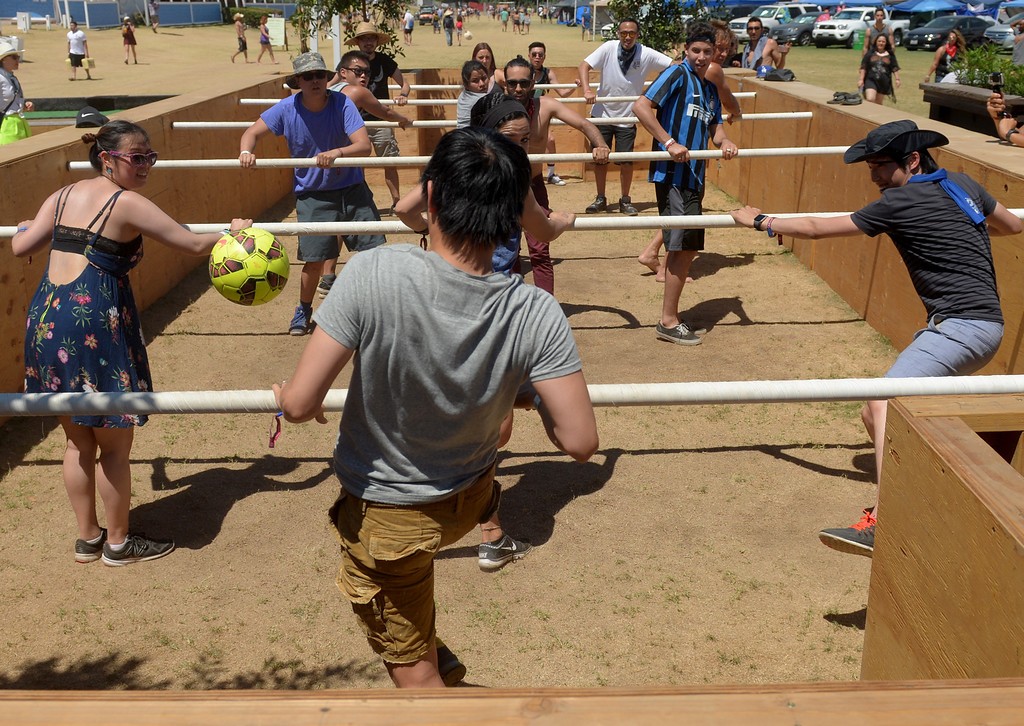 Teams play human foosball near the camp grounds at Coachella Day 2 week 2 in Indio CA. Friday April 22, 2016. (Thomas R. Cordova-Daily Breeze/Press-Telegram)