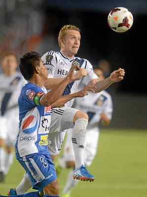 The Galaxy's Jack McBean battles for possession with Isidro Metapan's Milton Molina during the first half Wednesday night in Carson. (Will Lester/Inland Valley Daily Bulletin) 