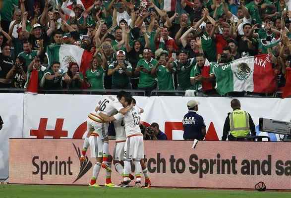 Mexico, seen celebrating a goal during its 3-1 victory over Uruguay on Sunday, has won 20 consecutive international matches. (Ross D. Franklin/The Associated Press)