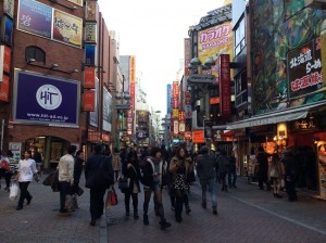 Shoppers scramble across intersection in Shibuya 
