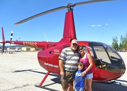 Family poses with SkyTime Air Tours in Mammoth. (Photo courtesy of SkyTime Air Tours)