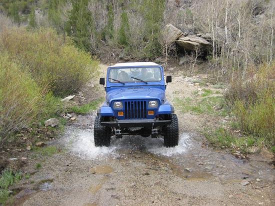 High  Sierra Jeep Adventures splashes through stream outside June Lake near Mammoth. (Photo courtesy of High Sierra)