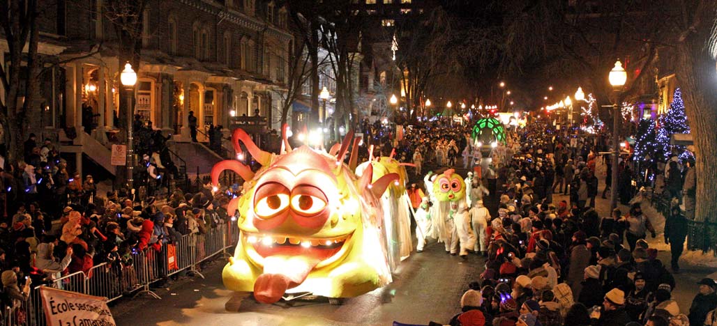 Spectators line the streets to watch the night parade in Quebec. Photos courtesy Quebec City Tourism