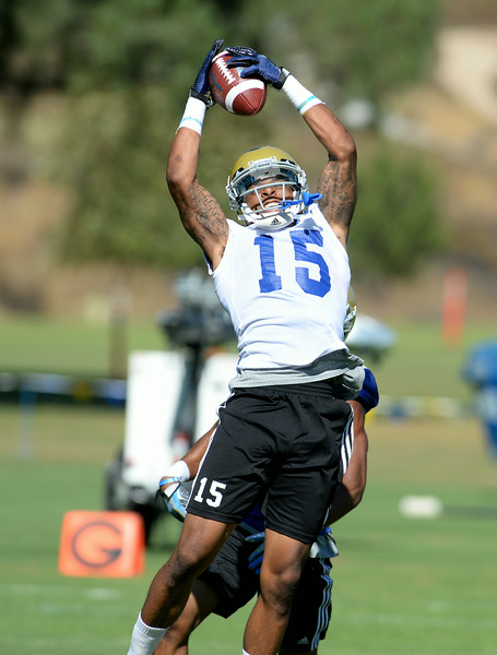 Receiver Devin Lucien makes a catch during UCLA training camp at Cal State San Bernardino. Tuesday, August 5, 2014. (John Valenzuela/ Daily Bulletin)