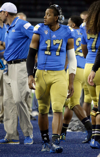 UCLA quarterback Brett Hundley (17) watches action against UCLA from the sideline during the second half of an NCAA college football game, Saturday, Sept. 13,  2014, in Arlington, Texas. He left the game after an injury in the first half. (AP/Tony Gutierrez)