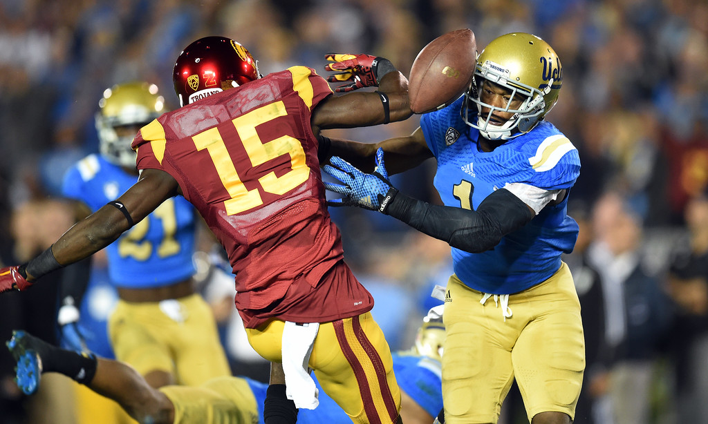 UCLA's Ishmael Adams, pictured breaking up a pass intended for USC's Nelson Agholor, was the lone Bruin on an All-Pac-12 first team. (Hans Gutknecht/Staff)