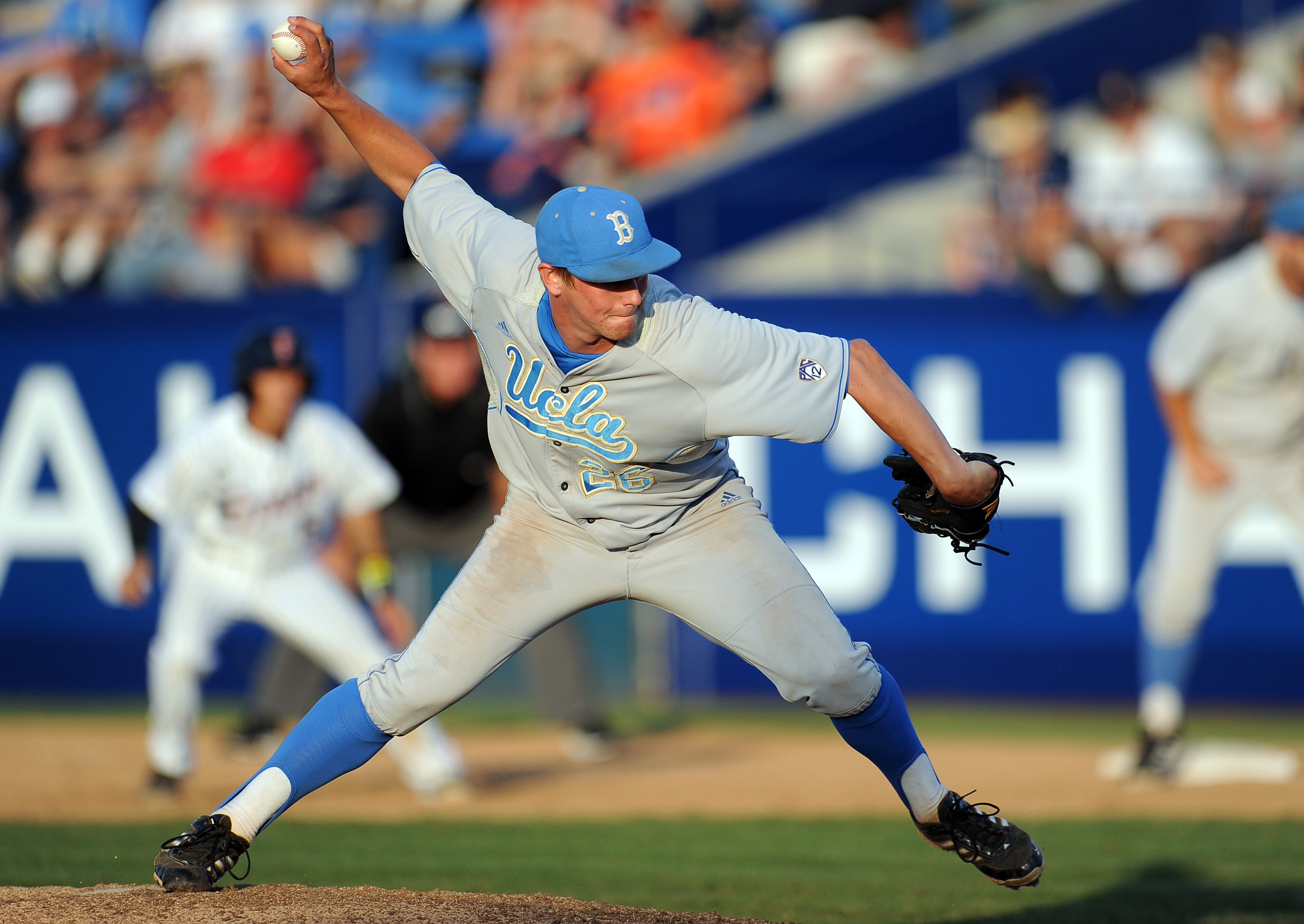 UCLA closer David Berg pitches against Cal State Fullerton in the NCAA Super Regionals on June 7, 2013. Berg won the first of his two NCBWA Stopper of the Year awards later that month. (Keith Birmingham/Staff)
