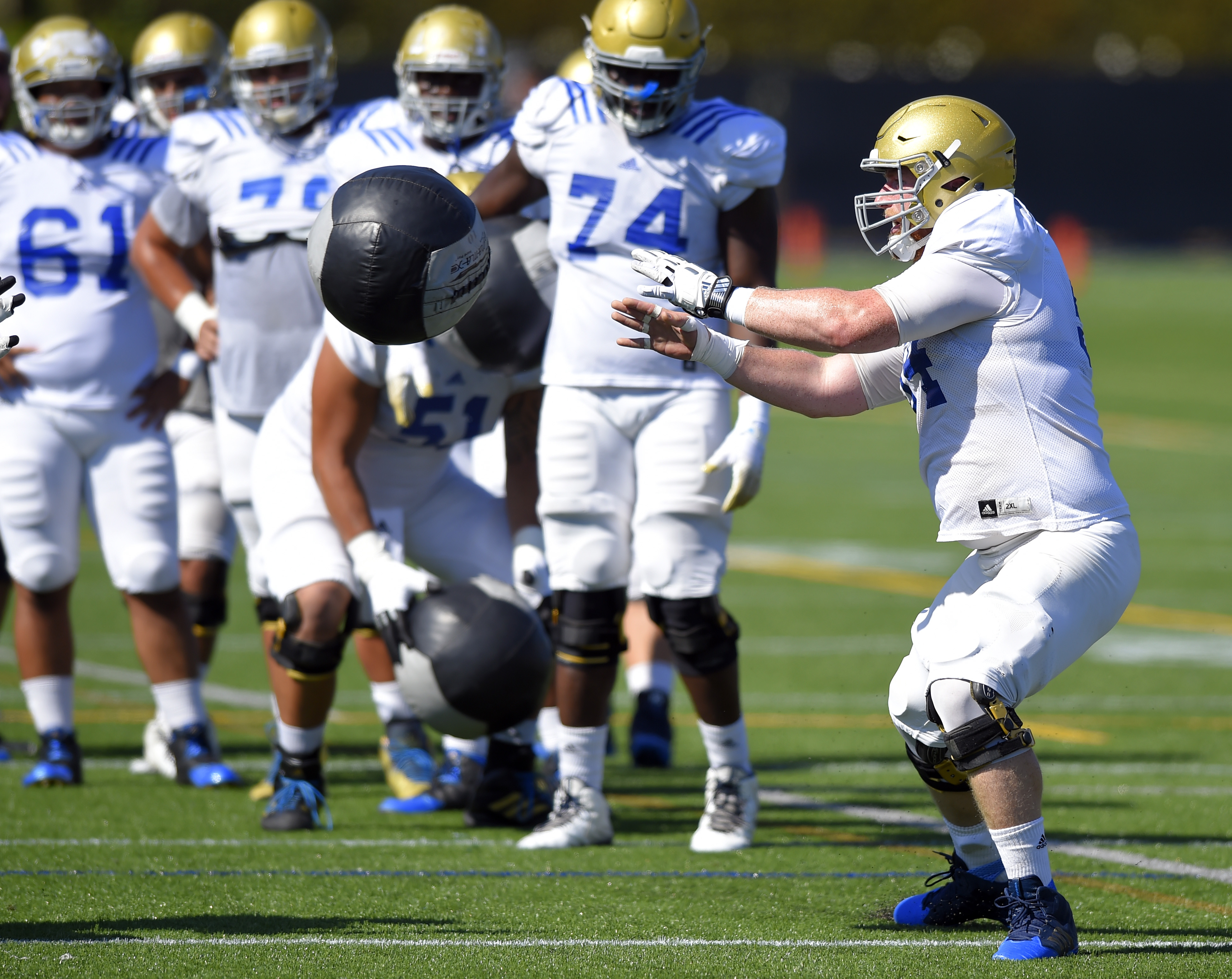 UCLA center Jake Brendel, pictured working out on campus, has accepted an invitation to the East-West Shrine Game. (Scott Varley/Staff)