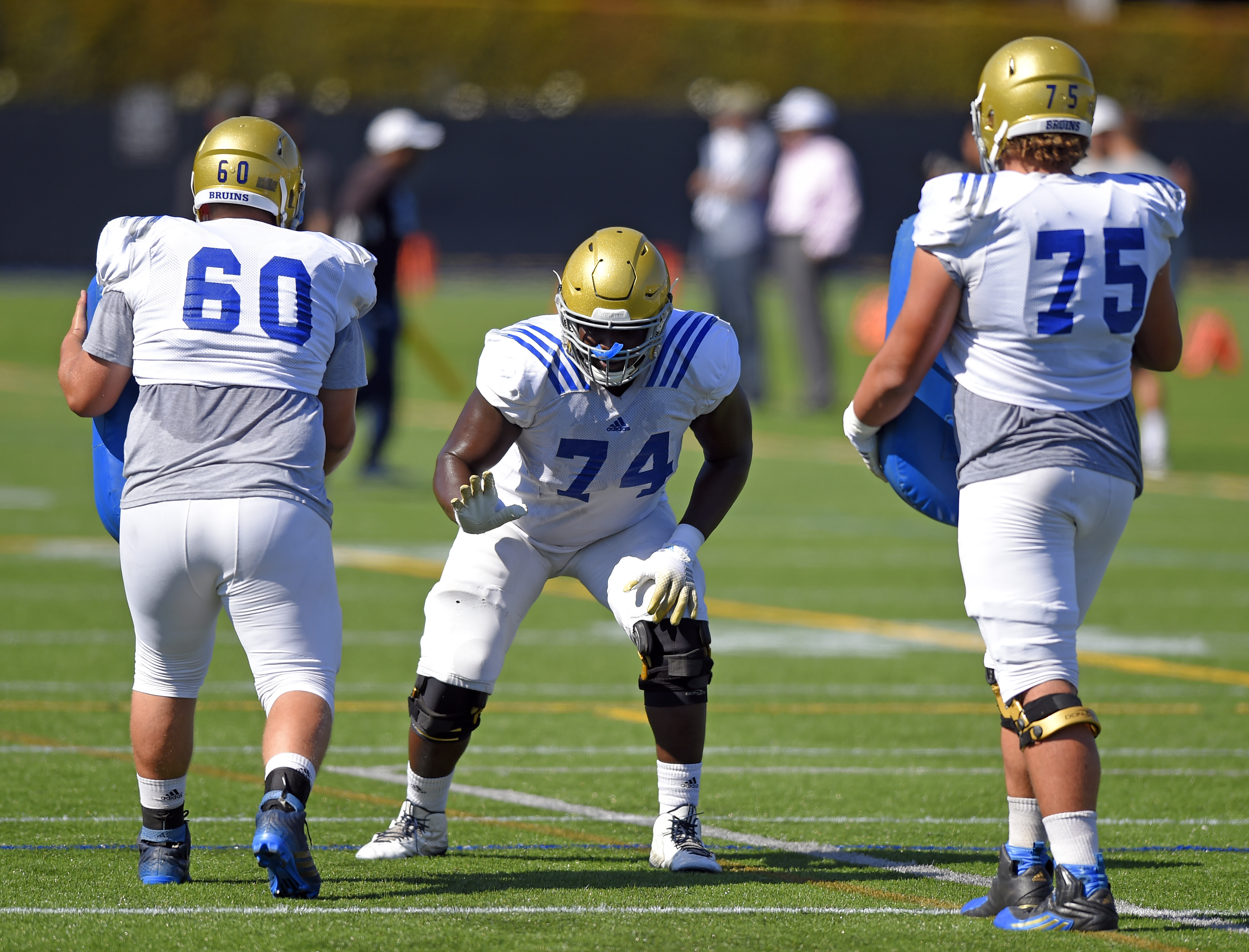UCLA offensive lineman Caleb Benenoch (74) is the third Bruin to declare for the NFL draft in less thank a week. (Scott Varley/Staff)