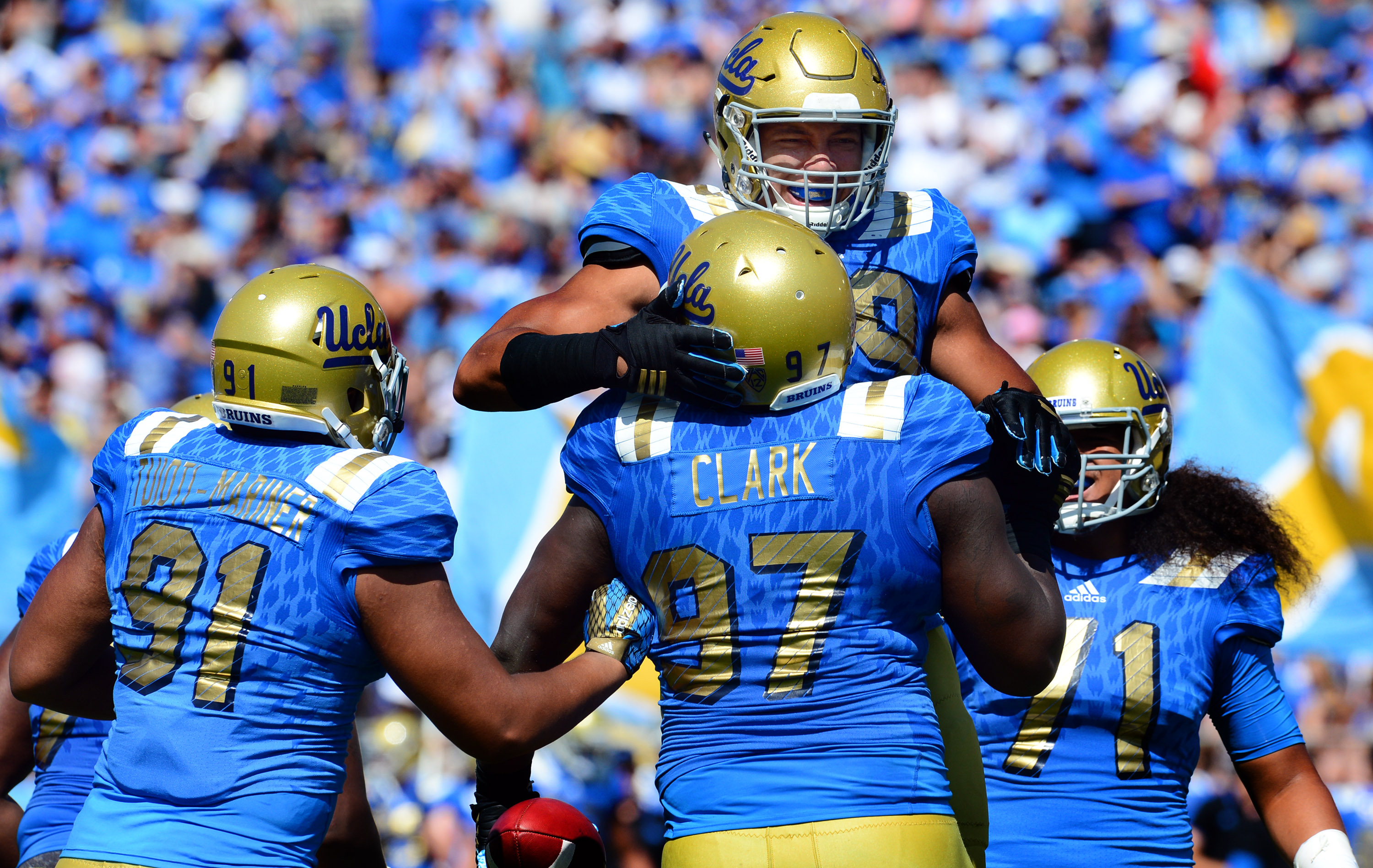 UCLA nose tackle Kenny Clark (97) was the Bruins' lone representative on the All-Pac-12 first team. He also caught at touchdown pass in UCLA's season-opening 34-16 win against Virginia. (Keith Birmingham/Staff)