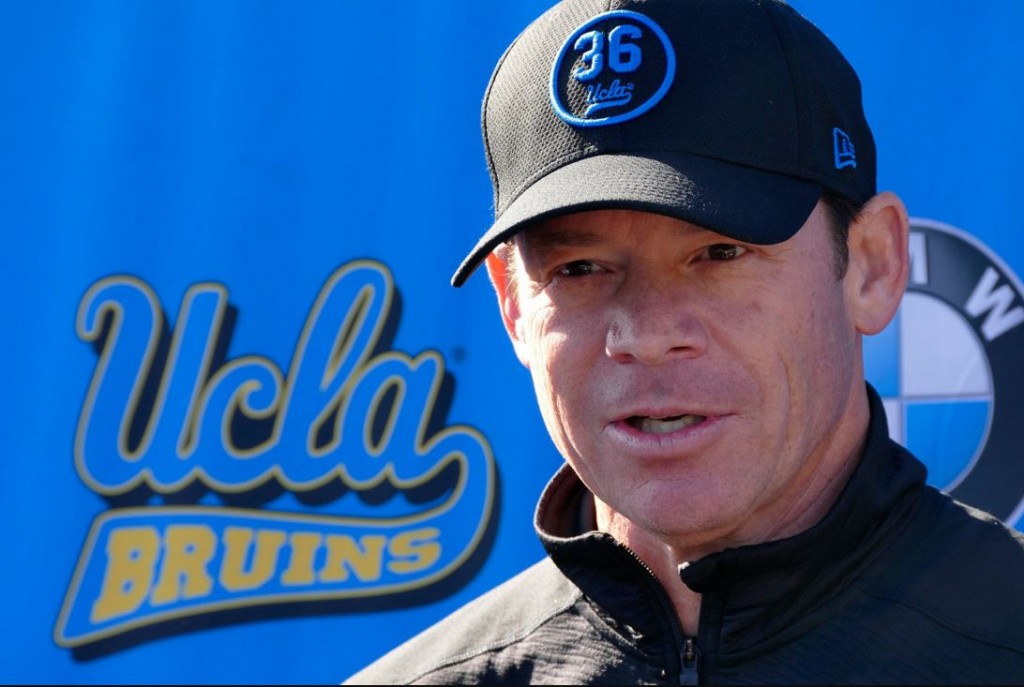 UCLA football head coach Jim Mora talks to the media after practice. Photo by Brad Graverson // Daily Breeze