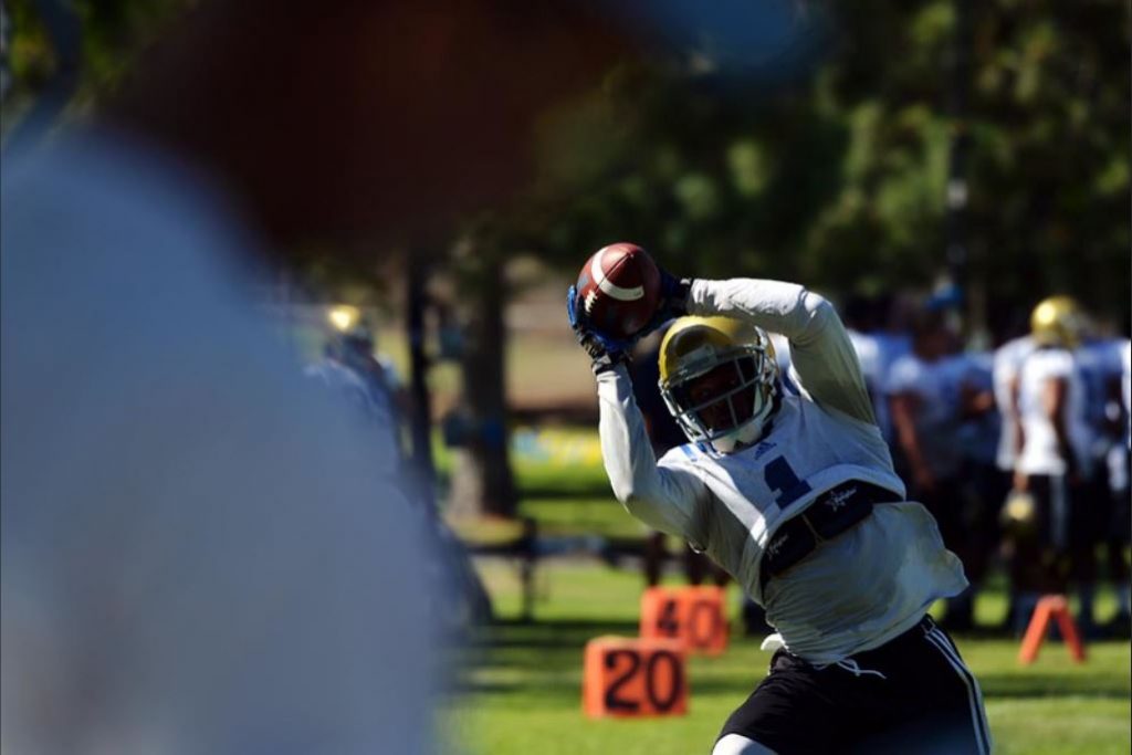 Receiver Ishmael Adams catches a pass during individual drills at practice. (Photo by Micah Escamilla/The Sun, SCNG)