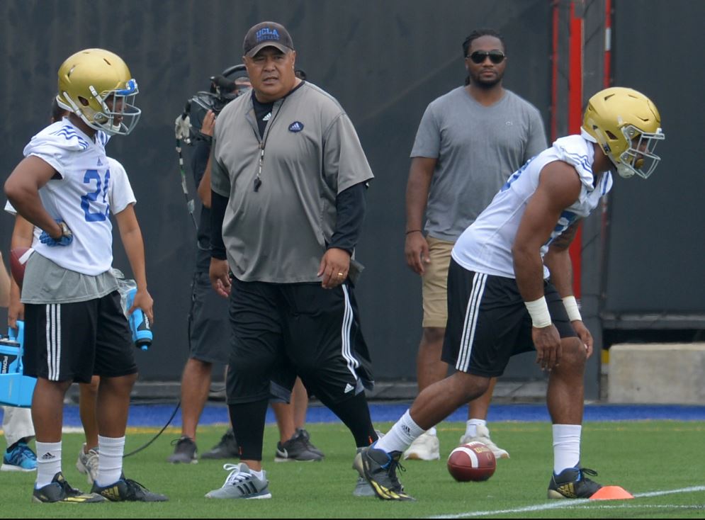 Offensive coordinator Kennedy Polamalu conducts drills at practice. Photo by Thomas R. Cordova/Staff photographer