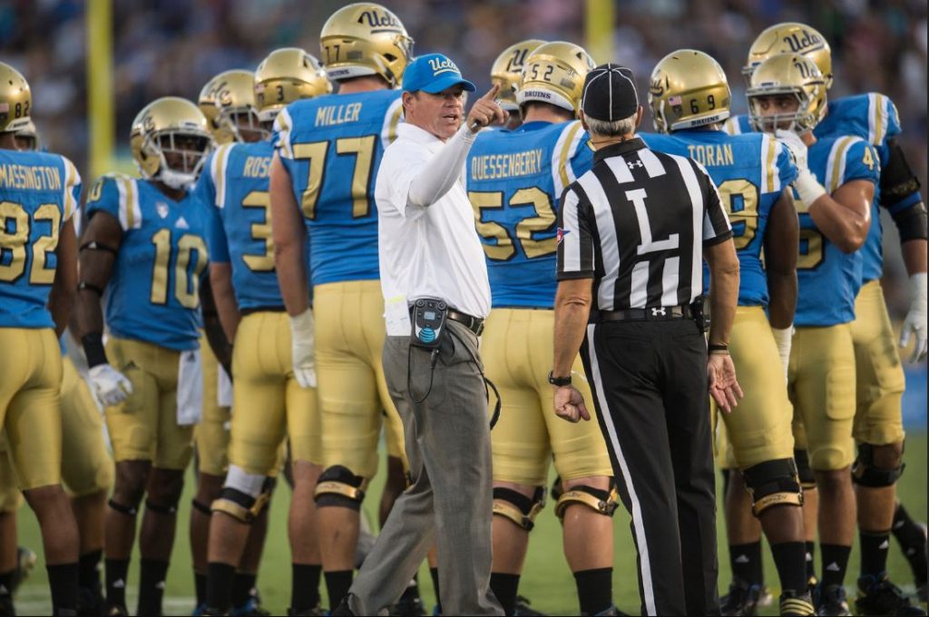 UCLA Bruins' head coach Jim Mora gathers his team during the second half against Stanford Cardinal at Rose Bowl Stadium in Pasadena on Saturday, September 24, 2016. (Photo by Ed Crisostomo, Orange County Register/SCNG)