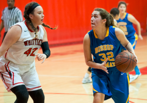 Whittier's Cassandra Hair (42) looks to block Bishop Amat's Damiana Bagues (32) in their varsity girls basketball game at Whittier High School in Whittier on Thursday January 8, 2015. (Photo by Keith Durflinger/Whittier Daily News) 