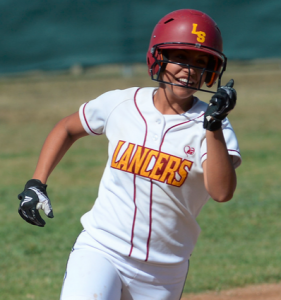 La Serna's Reanne Martinez scores against South Hills in the first inning of a prep softball game at South Hills High School in West Covina, Calif., on Friday, April 09, 2015. La Serna won 3-1. (Photo by Keith Birmingham/ Pasadena Star-News)