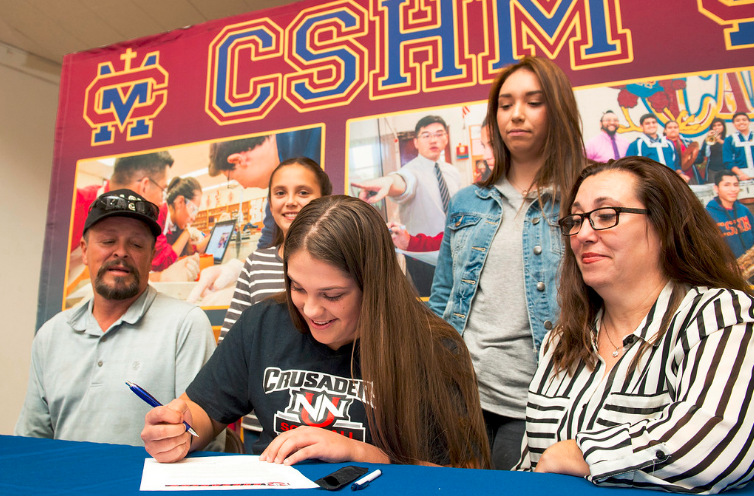Cantwell-Sacred Heart of Mary HS softball player Jackie Vargas signs her Letter of Intent for a scholarship with Northwest Nazarene University (Idaho) at the Montebello campus Nov. 30, 2016. (Photo by Leo Jarzomb, SGV Tribune/ SCNG)